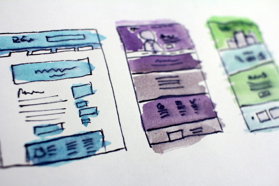 Desenho de layout de site feito no papel, planejamento de como será a navegação para o usuário.